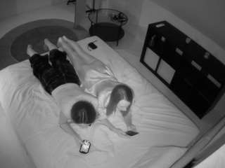 voyeurcam-julmodels-whitebed-2 webcam model stream image